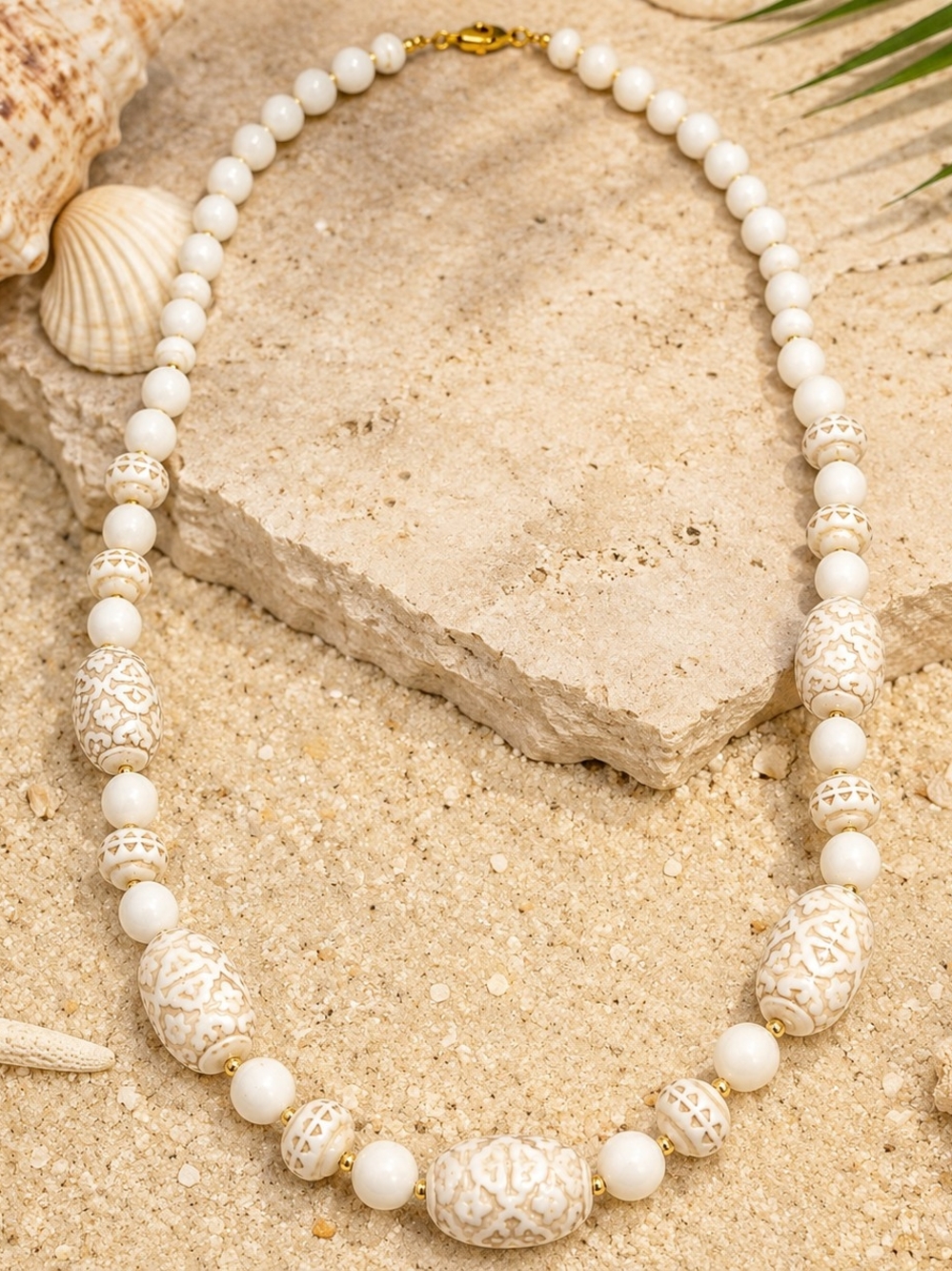 Vintage statement necklace featuring beautifully carved cream-tone resin beads